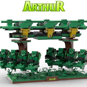 May include: A green and brown LEGO model of a roller coaster ride called "Arthur". The ride has two cars, each with four seats, and is suspended from a track that runs between two trees. The model is set on a green base with brown accents.