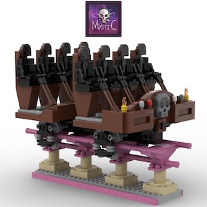 May include: A brown and black Lego model of a roller coaster car with a skull design on the front. The car is on a pink track and has six seats.