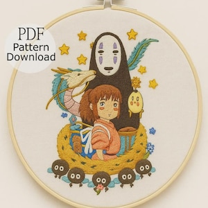 May include: Embroidered hoop art depicting characters from a well-known animated film. The design includes a girl in an orange outfit, a masked figure, a dragon, and several small, black soot sprites. The text "PDF Pattern Download" is also included.