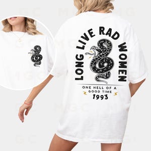 May include: White t-shirt with a black and white graphic of a snake with the text "Long Live Rad Women" and "One hell of a good time 1993" printed on the back.