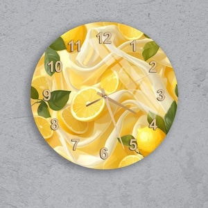 May include: Round wall clock with a yellow and white background featuring lemons and green leaves. The clock face has black numbers and hands. The clock is a decorative item for a kitchen or dining room.