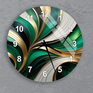 May include: Round wall clock with a decorative design in gold, white, and green hues. The clock face has black hands and gold numerals. The clock is mounted on a grey wall.