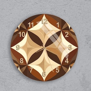 May include: A round wall clock with a geometric design in shades of brown, beige, and cream. The clock face features a starburst pattern with gold-colored numerals marking the hours. The clock is mounted on a gray wall.