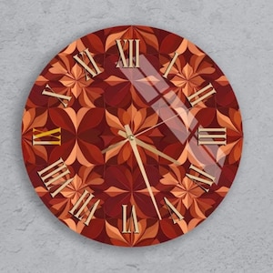 Puede incluir: Reloj de pared redondo con un diseño floral en tonos rojos y naranjas. La esfera del reloj tiene números romanos y manecillas doradas. Un elemento decorativo para el hogar, con un diámetro de unos 30 cm.