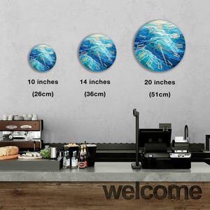 a coffee shop with three different types of coffee machines