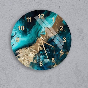 Reloj de pared de cristal abstracto moderno, diseño en verde azulado y dorado, silencioso, sin tictac, elegante decoración para sala de estar, regalo minimalista contemporáneo.