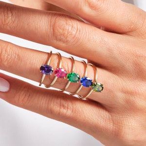 Oval Ruby Ring – 14K Solid Gold ❤️✨
This elegant oval ruby birthstone ring is crafted in solid gold and designed with a timeless solitaire setting. The rich red gemstone brings warmth, passion, and meaning to any look. Its slim, stackable band makes it perfect for daily wear—either on its own or paired with your favorite rings. A delicate and feminine piece for women who love classic ruby jewelry.