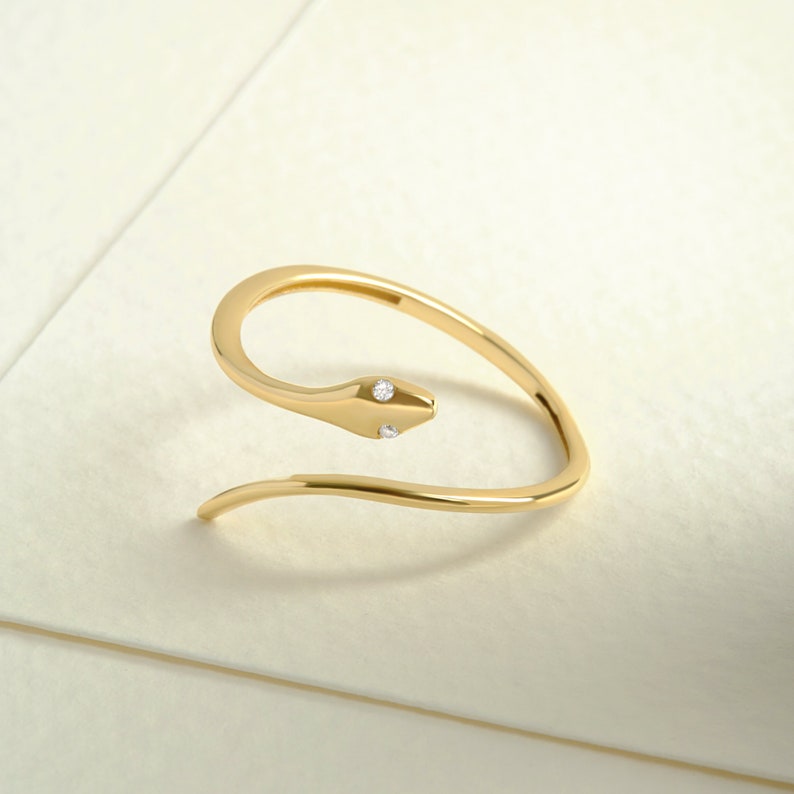 Here's the Stylish Solid Gold Snake Ring by Christo! Our  Solid Gold Open Snake Ring is perfect Stackable and Daily Spiral Open Ring for Girls. This Classy Minimalist Multi Layer Snake Ring is designed as Premium Chick Middle Finger Ring