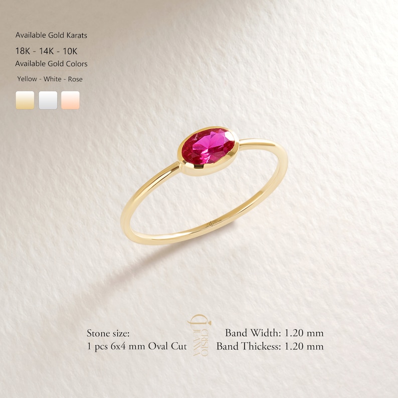 Oval Ruby Stacking Ring – 10K / 14K / 18K Solid Gold ❤️✨
A vibrant oval-cut ruby set on a slim gold band, perfect for stacking or wearing alone. This customizable birthstone ring is ideal for personalized gifts, bridesmaids, or celebrating special moments with a touch of elegance.