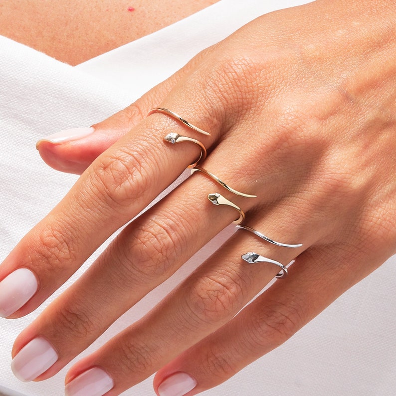 Here's the Stylish Solid Gold Snake Ring by Christo! Our  Solid Gold Open Snake Ring is perfect Stackable and Daily Spiral Open Ring for Girls. This Classy Minimalist Multi Layer Snake Ring is designed as Premium Chick Middle Finger Ring