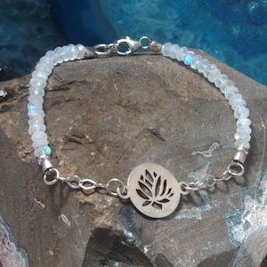 Illuminate Your Path: Moonstone and Lotus Flower Charm Bracelet in 950 Silver