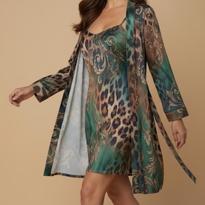 May include: A green and brown patterned sleepwear set featuring a slip dress and a long robe. The set has a leopard print design with ornate gold accents. The robe has long sleeves and a tie belt. The sleepwear is made of a silky material.