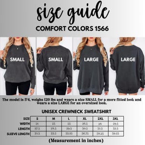 May include: Size chart for a unisex crewneck sweatshirt in various sizes, including small, medium, large, extra large, 2XL, and 3XL. The chart shows measurements in inches for width, length, and sleeve length.