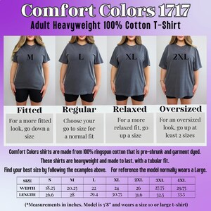 May include: A display of Comfort Colors 1717 adult heavyweight 100% cotton t-shirts in various sizes, including M, L, XL, and 2XL. The image provides sizing guidance, with measurements in inches. The shirts are pre-shrunk and garment dyed.