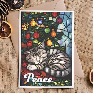 Tarjeta navideña con diseño de gato calicó en vitral: Felices fiestas. Disponible sola o en paquete de 12. *Mensaje interno personalizado o en blanco.