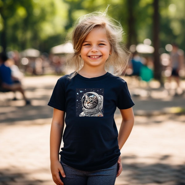 Cute Cat in Space T Shirt Kids Sizes Featuring a Cat Astronaut Looking out a Helmut Super Soft Youth Short Sleeve Tee