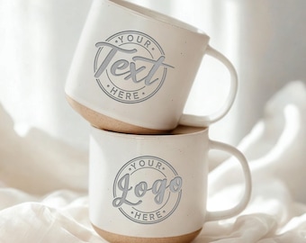 May include: Two white ceramic mugs stacked on top of each other. Each mug has a light brown base and a curved handle. The top mug has the text "YOUR TEXT HERE" in a circle. The bottom mug has the text "YOUR LOGO HERE" in a circle.