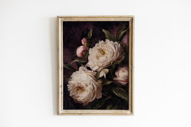 May include: A framed floral print featuring a bouquet of white peonies with yellow centers and pink buds against a dark purple background. The painting is in a gold-toned frame, creating a vintage aesthetic.