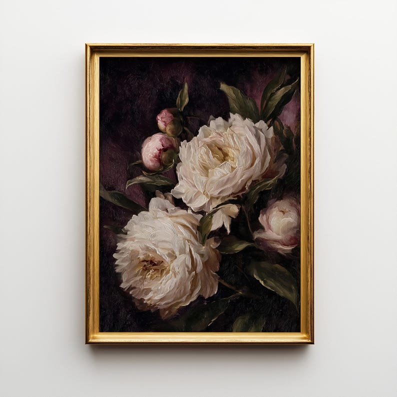 May include: A framed floral painting featuring white peonies with hints of pink against a dark background. The flowers are in full bloom, with detailed brushstrokes. The gold frame adds a classic touch to the artwork, suitable for home decor.