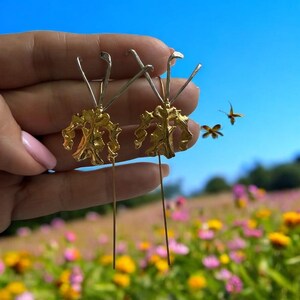 La Mariposa:  Gold And White Gold Orchid Flower Tone Gold and Silver Dangle Earrings • Psychopsis Earrings  •   Joyeria de Orquídeas