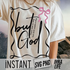May include: Cream-colored t-shirt with a black script design that reads "but God" inside a wavy black border. A pink bow is on the right side of the design. The text "There was no way, but GOD made a way" is also on the shirt.