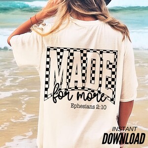 May include: Cream-colored t-shirt with a black and white checkered design that spells out "MADE" and the words "for more" in a script font. The text "Ephesians 2:10" is below the script. The words "INSTANT DOWNLOAD" are at the bottom.