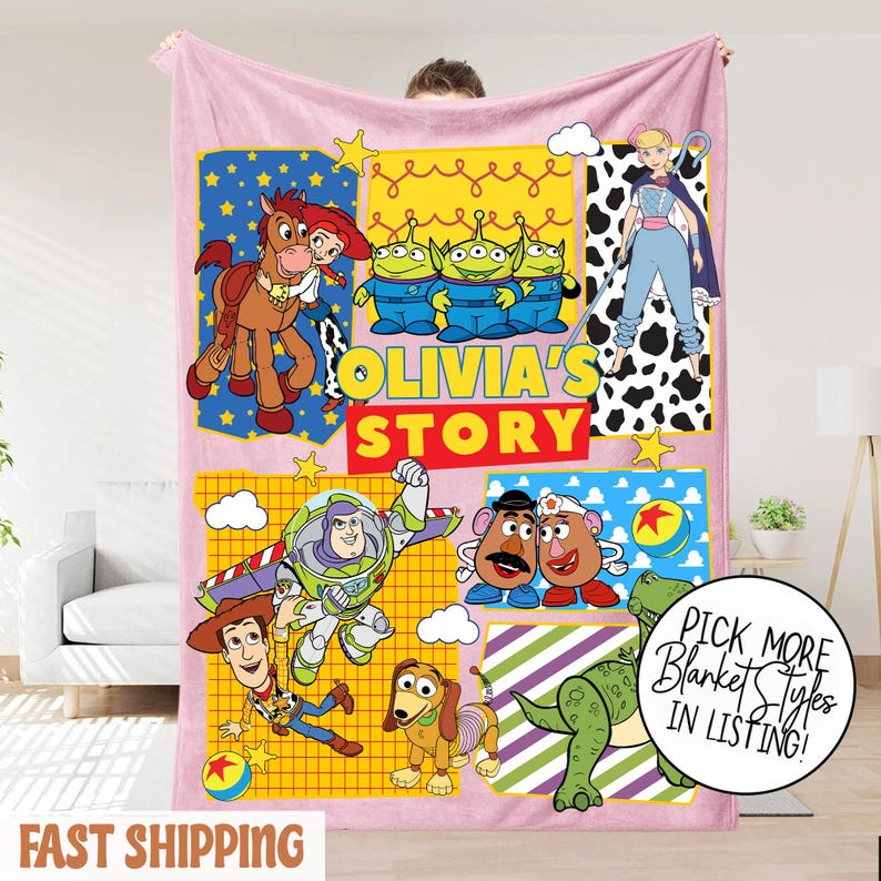 Puede incluir: Manta de forro polar rosa con personajes de la pel&iacute;cula Toy Story. La manta tiene un dise&ntilde;o colorido con el texto "OLIVIA'S STORY". La manta tambi&eacute;n tiene el texto "FAST SHIPPING" y un c&iacute;rculo con el texto "PICK MORE Blanket Styles IN LISTING!"