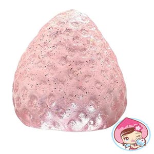 Puede incluir: Un juguete blando en forma de fresa rosa y brillante. El juguete está hecho de un material suave y flexible y tiene una superficie texturizada.