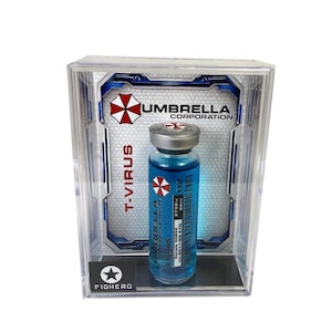 May include: A clear display case contains a vial of blue liquid labeled "T-Virus" and "Umbrella Corporation." The vial has a silver cap and a red and white logo. The display case has a black base with the word "FIGHERO."