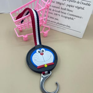 Doraemon intrekbare hanger autohaak, autostoelhaak, babywagen universele haak, haak voor tas, auto-interieur