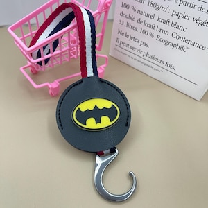 Batman intrekbare autohaak, autostoelhaak, universele haak babywagen, tashaak, auto-interieur