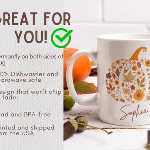 May include: White ceramic mug featuring a pumpkin design made of fall leaves and flowers in shades of orange, yellow, and brown. The name "Sophia" is written in a script font. The mug has the text "GREAT FOR YOU!" and other text on the side.