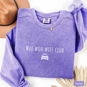 Police wife sweatshirt Wee Woo Wife Club Comfort Colors law enforcement spouse

Cop wife crewneck sweatshirt police family support shirt

Law enforcement wife sweatshirt casual everyday wear

Wee Woo Wife Club police spouse gift Comfort Colors

Police wife apparel cozy cop wife sweatshirt