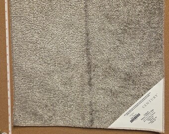 Op de afbeelding: Een vierkant beige stofstaal met een getextureerd, geweven oppervlak. Een wit meetlint langs de linker- en onderrand toont afmetingen van ongeveer 43 cm bij 43 cm. Een hoeklabel vermeldt CENTURY, Grade 46, Pattern 718781.22 Beige.