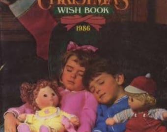 May include: Three children are sleeping with their dolls. The children are wearing pajamas and the dolls are dressed in colorful outfits. The image is from a 1986 Christmas Wish Book.