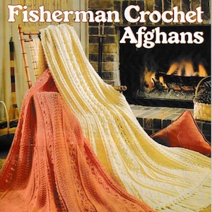 May include: A crochet pattern booklet for Fisherman Crochet Afghans, featuring two crocheted blankets in orange and white, draped over a wooden chair in front of a fireplace. The booklet cover includes the text "Fisherman Crochet Afghans" and "Designed by Anne Rabun Ough".