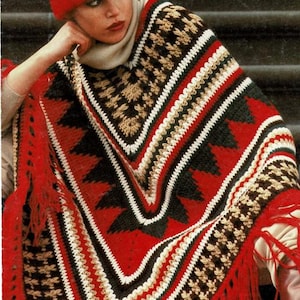 May include: A red, black, white, and green crochet poncho with fringe. The poncho has a geometric pattern and is worn by a person with a red hat. The pattern is called "Clackheaton Design 0016" and is available in sizes 81 to 102 cm.