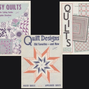 May include: Three vintage quilt pattern books with colorful covers. The first book is titled "Easy Quilts" and features a variety of quilt designs in pink, purple, and green. The second book is titled "Quilt Designs" and features a large, orange, white, and blue star quilt design. The third book is titled "Quilts" and features a pink and green quilt design.