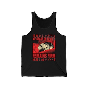 May include: Black tank top with a red graphic of a hamster in a red box. The text on the graphic reads "現実をしっかりと MY GRASP ON REALITY REMAINS FIRM 把握し続けている".