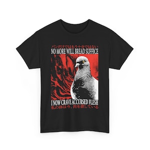 May include: Black t-shirt featuring a pigeon illustration with red and white accents. The text "NO MORE WILL BREAD SUFFICE" and "I NOW CRAVE ACCURSED FLESH" is printed above and below the image, with Japanese text above and below the English text.