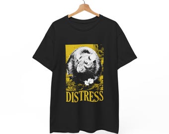 May include: Black t-shirt featuring a yellow graphic of a rat and the word "DISTRESS" printed in white.