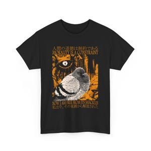 May include: Black t-shirt featuring a detailed illustration of a pigeon with orange and black accents. The shirt includes the text "MORALITY IS A CONSTRAINT" and "NOW I AM FREE FROM ITS SHACKLES" in English and Japanese.