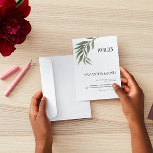 May include: A white wedding invitation with green foliage and the text "19 11 25", "Samantha & Josh", "Invite you to celebrate their wedding", "Saturday 19th November", "at Peterson House, Newcastle", "RSVP to: 0412 345 678".