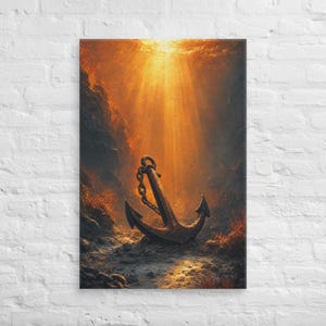 May include: A dark metal anchor rests on the sandy, textured ocean floor. Golden light rays filter down from the surface through the deep water, illuminating the anchor and the surrounding rocky, seaweed-covered underwater terrain.