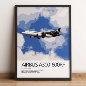 May include: A framed poster featuring a white and brown UPS Airbus A300-600RF cargo plane flying against a blue and white cloud background. The text reads AIRBUS A300-600RF, THE ORIGINAL BUS, INTRODUCED 24TH MAY 1994 WITH FEDEX, FIRST FLIGHT 2ND DECEMBER 1993, PRODUCED 1993 TO 2007 (101 BUILT).