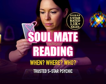 May include: A woman holding a tarot card with a heart design, with the words "SOUL MATE READING" in large pink letters. The image also includes the text "WHEN? WHERE? WHO?" and "TRUSTED 5-STAR PSYCHIC". A candle and a stained glass lamp are visible.