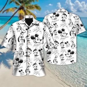 May include: White button-up shirt with a black and white cartoon print of Mickey Mouse, Donald Duck, and Goofy. The print features the characters' faces and signatures.