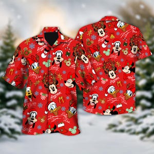 May include: Red short-sleeved shirt with a pattern of Disney characters such as Mickey Mouse, Minnie Mouse, Donald Duck, and Goofy, alongside Christmas symbols like snowflakes and candy canes. The shirt has a classic collar and button-up front.