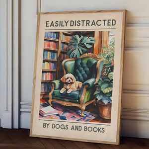 May include: A poster with a green armchair with a dog sitting in it. The poster has the text "Easily Distracted by Dogs and Books" on it.