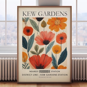 May include: A framed art print with a floral design, featuring orange, red, and yellow flowers, and dark green leaves. The print includes the text "KEW GARDENS" and station information. The artwork is displayed in a room with a window and a radiator.